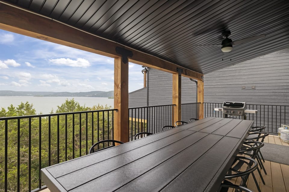 Waterfront Green - Main Level: Outdoor dining table on deck