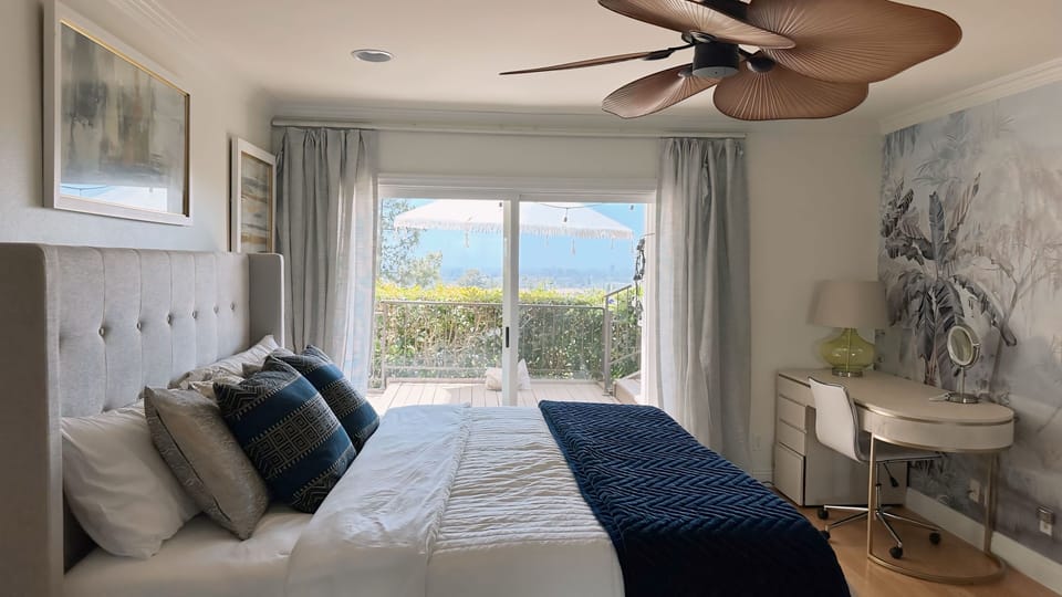 Downstair master bedroom with city and garden view