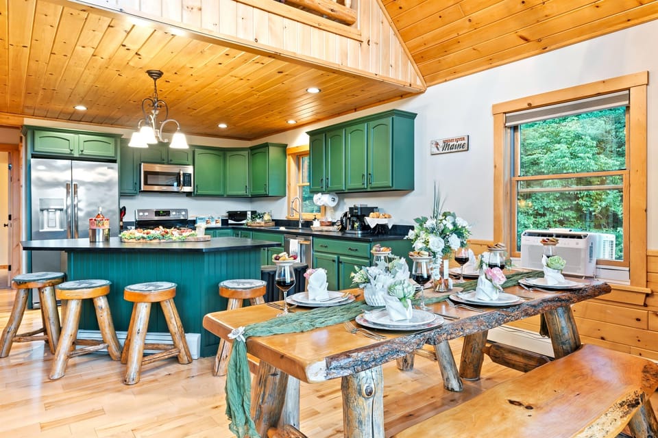 Our dining room offers convenient access to the kitchen, making mealtime preparation and serving a breeze.
