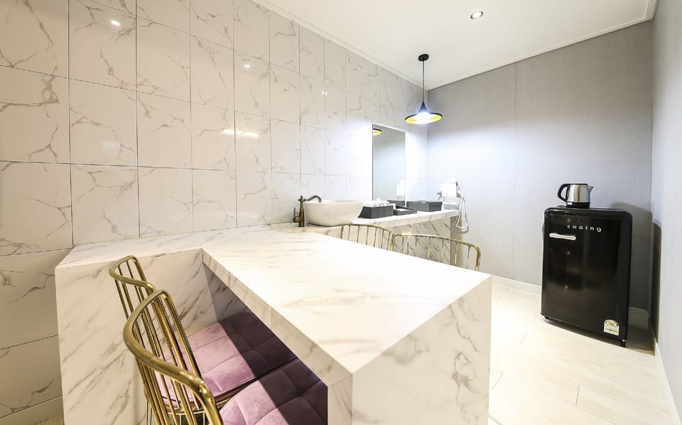 Premium Double Room, City View | Living area | 65-inch LED TV with cable channels, Netflix, heated floors