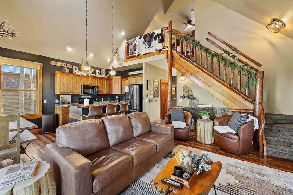 Main level family room with wood burning fireplace