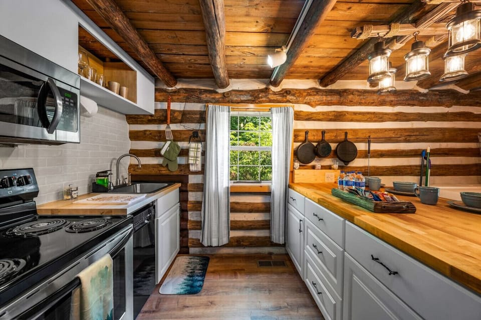 The kitchen includes stainless steel appliances and plenty of countertop space.