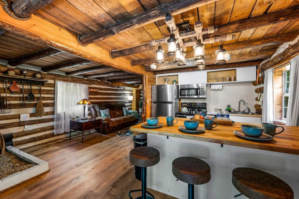 The kitchen is fully equipped with everything you need to make meals at the cabin.