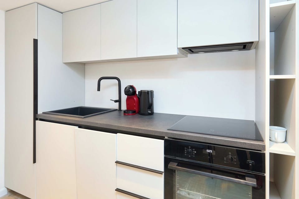 Comfort Apartment | Private kitchen | Microwave, oven, stovetop, electric kettle