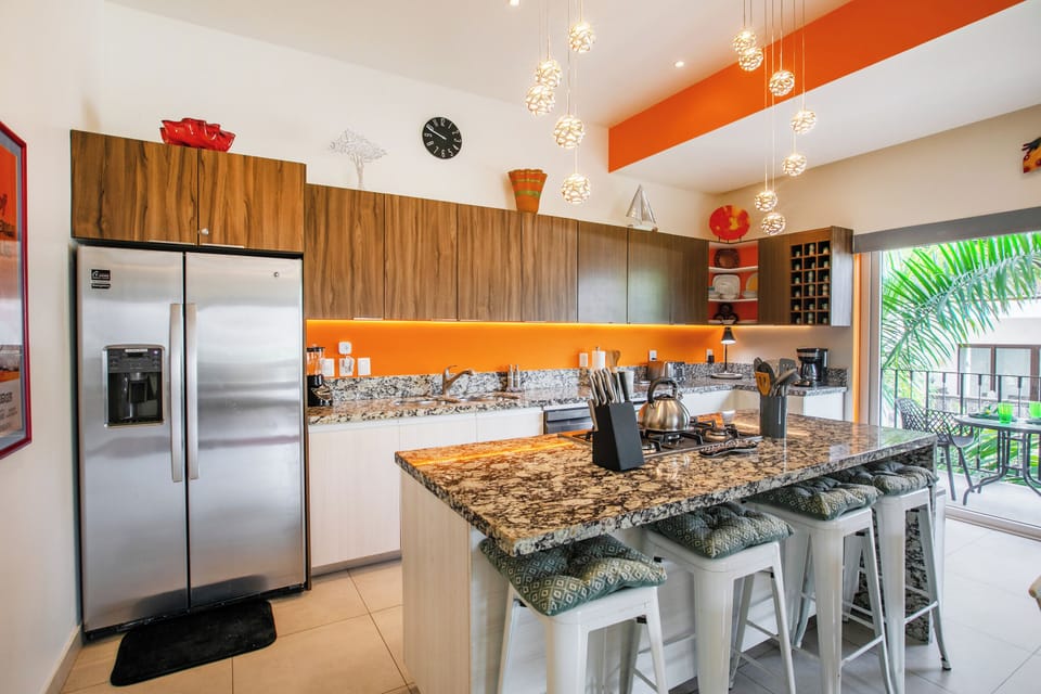 Gourmet kitchen with stainless steel appliances and modern design
