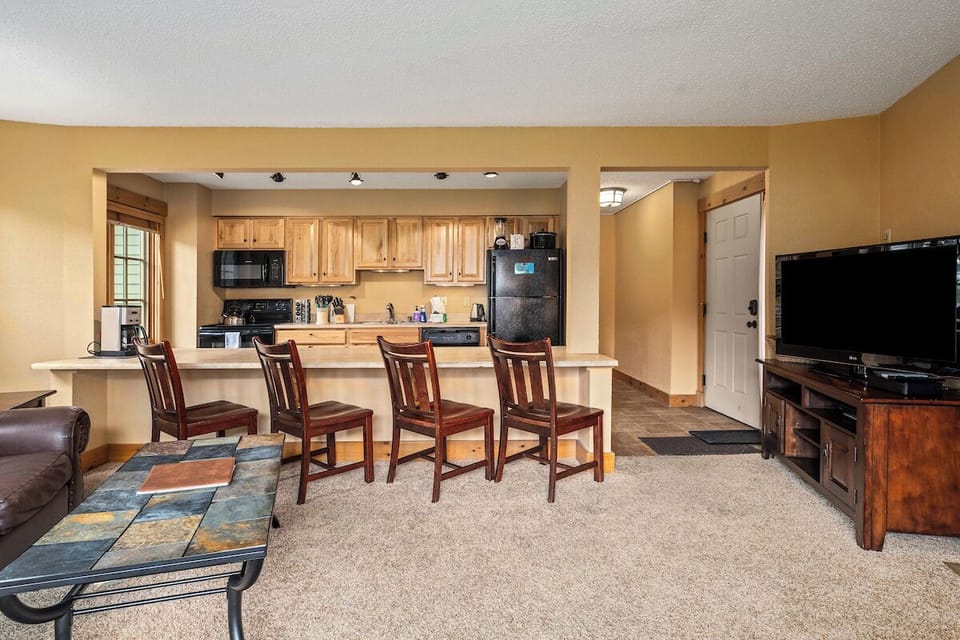 Couch, coffee table, TV