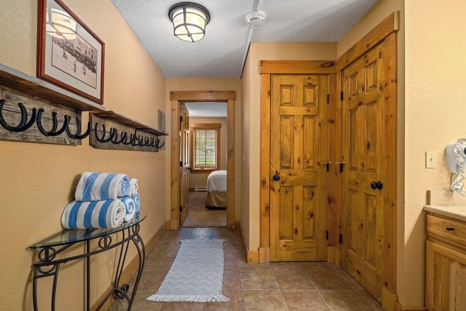 Hallway, towels, closets, hooks