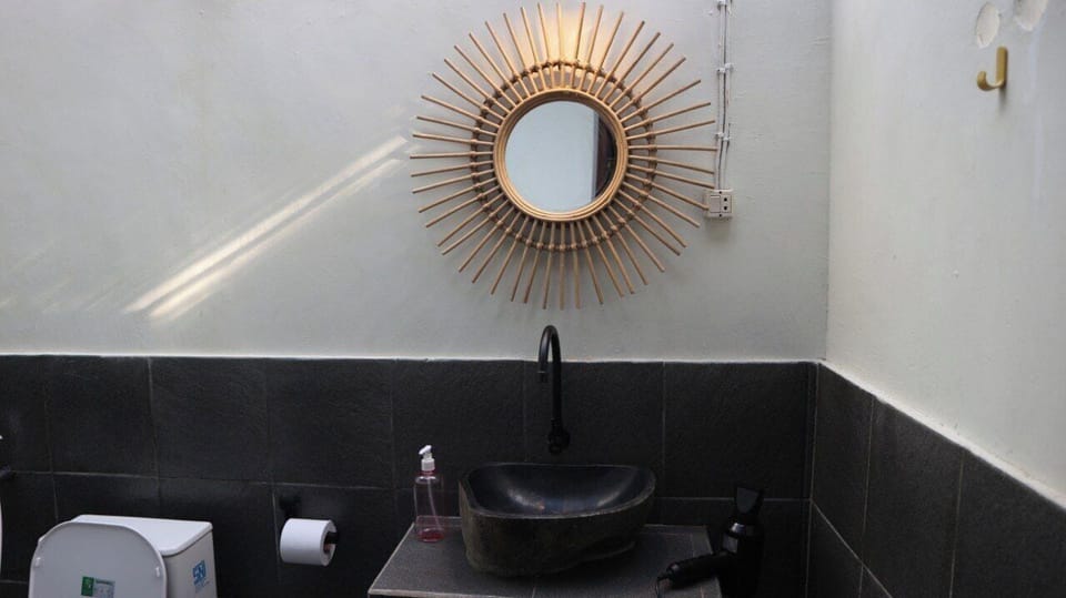 Bungalow, River View | Bathroom | Shower, hair dryer, towels