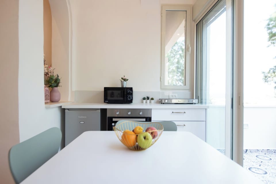 Luxury Apartment, Balcony, Sea View | Private kitchenette | Espresso maker, coffee/tea maker, electric kettle, dining tables