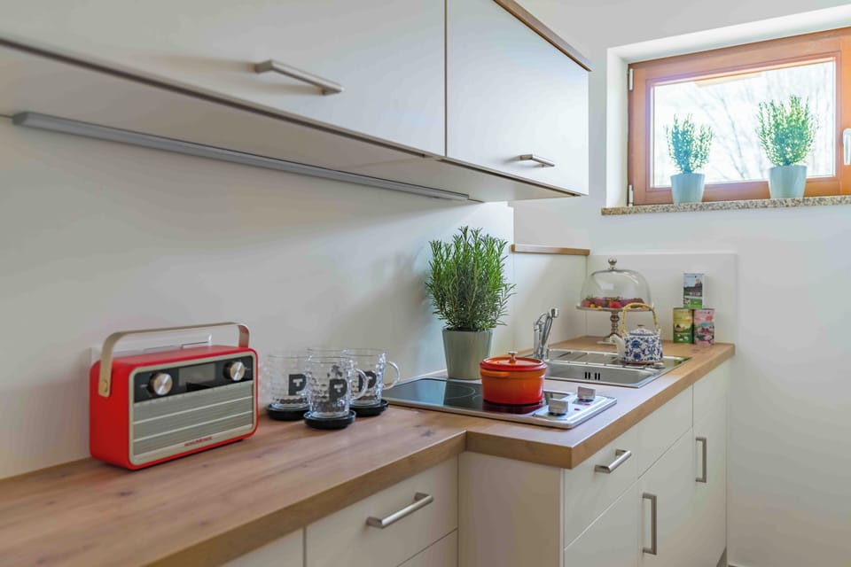 Suite, Balcony | Private kitchen
