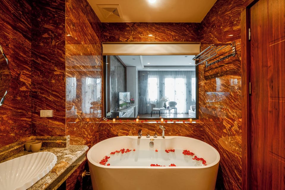 Panoramic Quadruple Room, 2 Queen Beds, Hot Tub, Bay View | Bathroom | Shower, hydromassage showerhead, designer toiletries, hair dryer