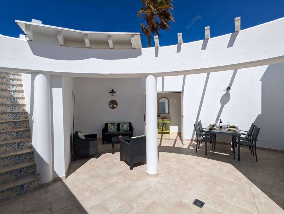 Outside area to the villa, with outside dining and chillout area