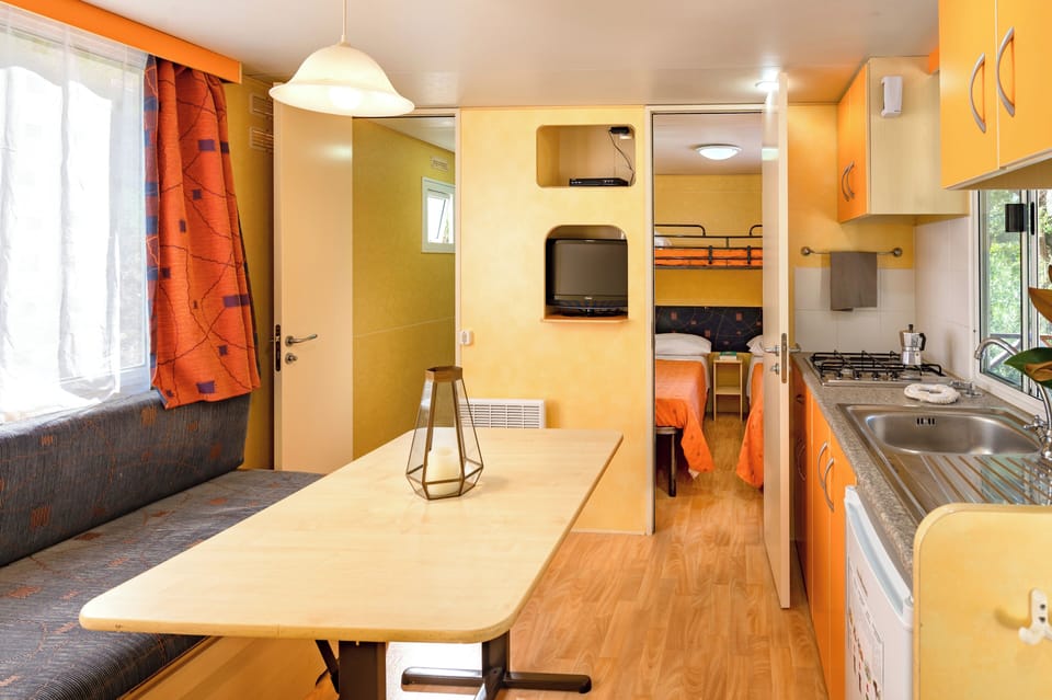 Mobile Home, 2 Bedrooms | Living area | 27-inch TV with digital channels