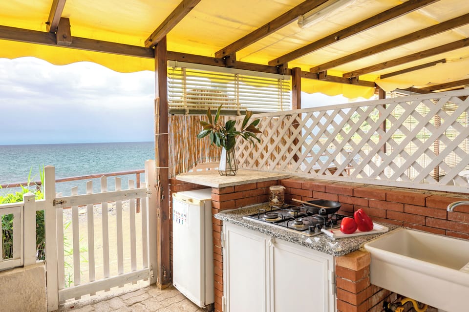 Caravan External Private Bathroom | Private kitchen | Fridge, stovetop, cookware/dishes/utensils