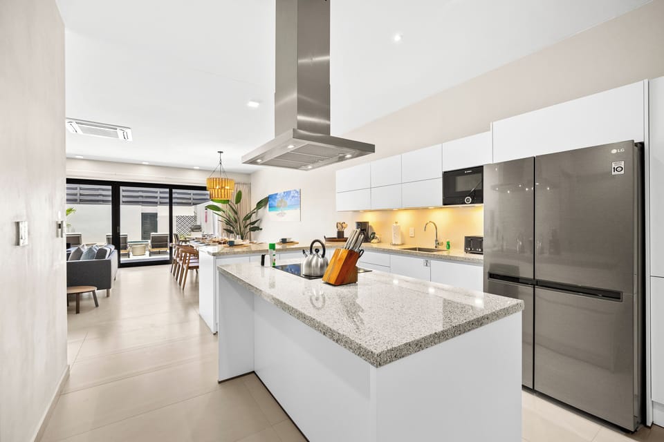 Indulge your inner chef in fully equipped kitchen of the apartment in Noord Aruba - Featuring modern stainless steel appliances and plenty of space for culinary creations - An open-concept layout and spacious countertops for meal preparation