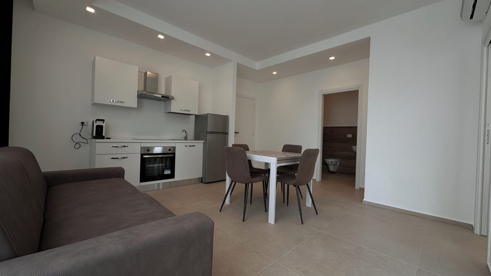 Deluxe Condo, 1 Queen Bed with Sofa bed, Garden View, Garden Area | Private kitchen | Full-size fridge, oven, stovetop, electric kettle