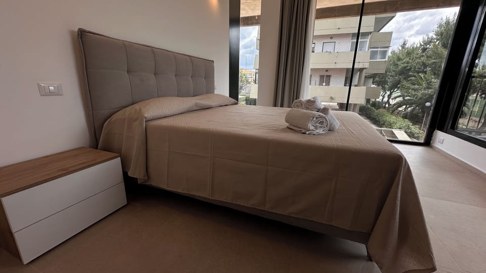 Deluxe Condo, 1 Queen Bed with Sofa bed, Garden View, Garden Area | 1 bedroom, desk, soundproofing, free WiFi
