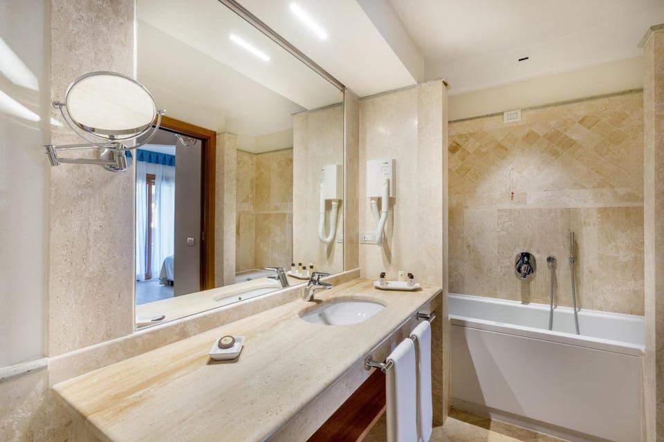 Shower, free toiletries, hair dryer, bathrobes