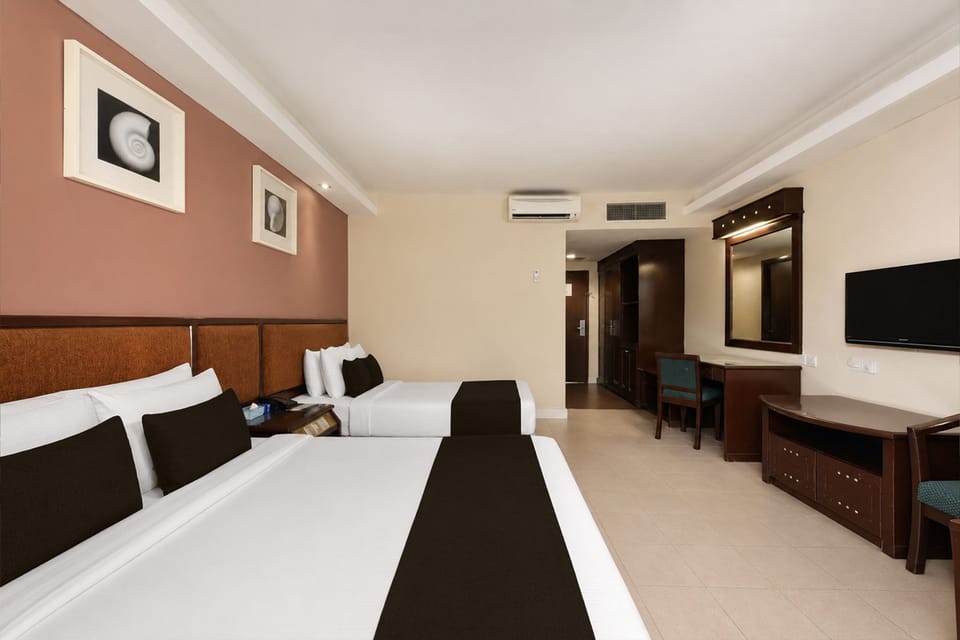 Malaysia Deluxe Triple | Minibar, desk, soundproofing, iron/ironing board (on request)