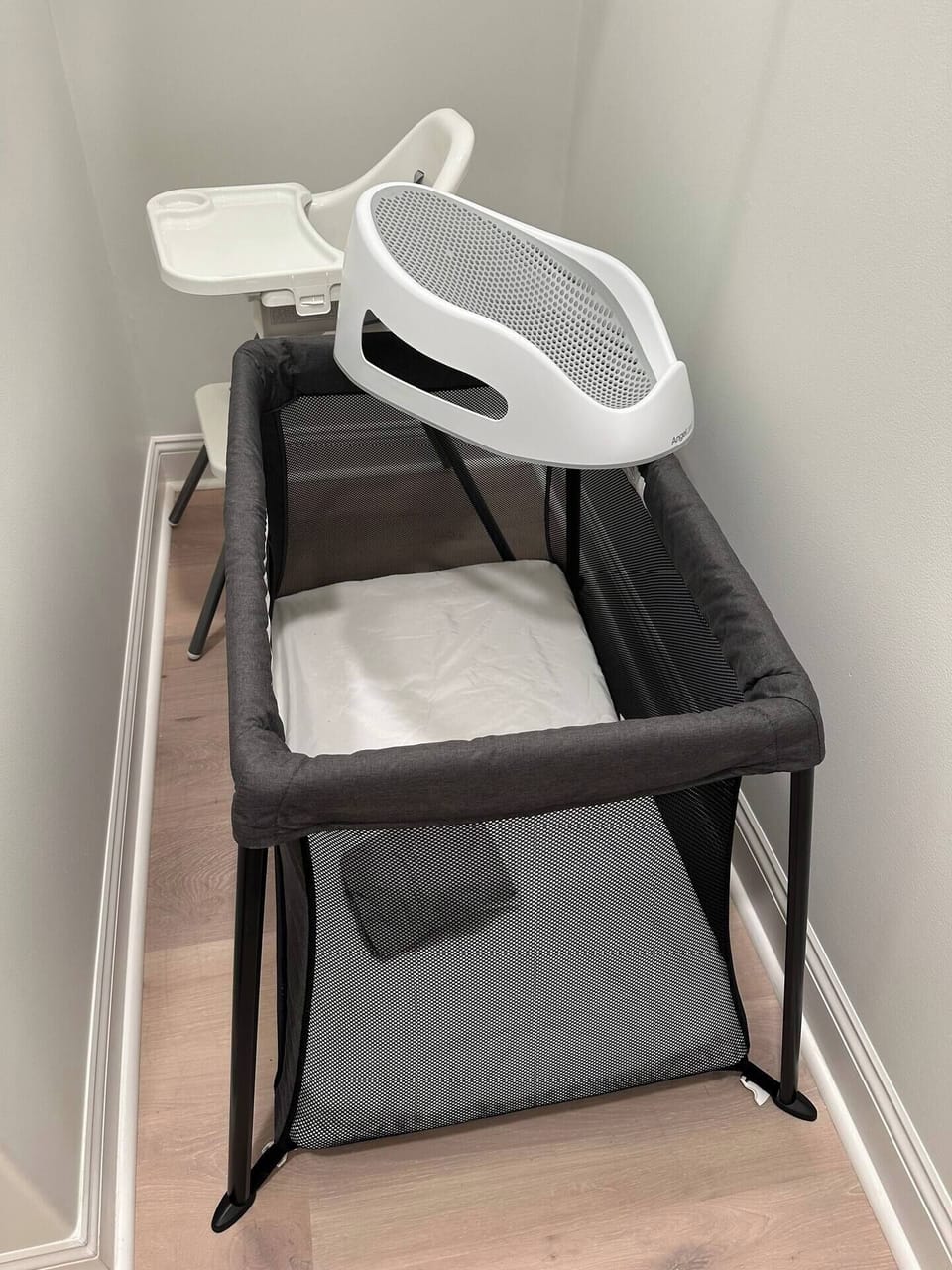 A travel crib, high chair, and baby bath are all provided. They are located in the master bedroom closet