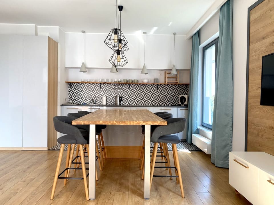 Design Apartment, Balcony, City View | Private kitchen | Fridge, stovetop, dishwasher, coffee/tea maker