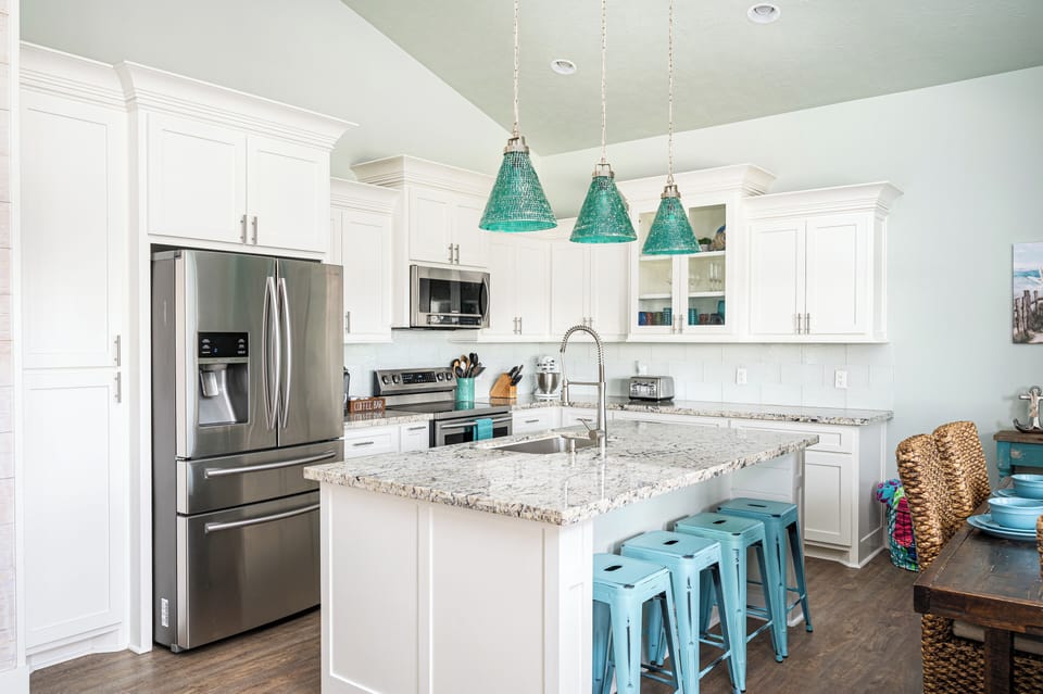 This kitchen has it all! Seating for 4 at the island and 6 at the table.