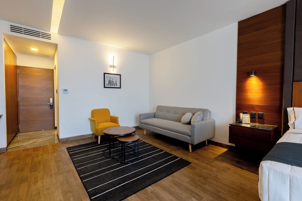 Superior Room, City View | Living area | 55-inch Smart TV with cable channels