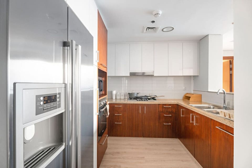 Kitchen Delight: Modern appliances and sleek cabinets await your culinary adventures!