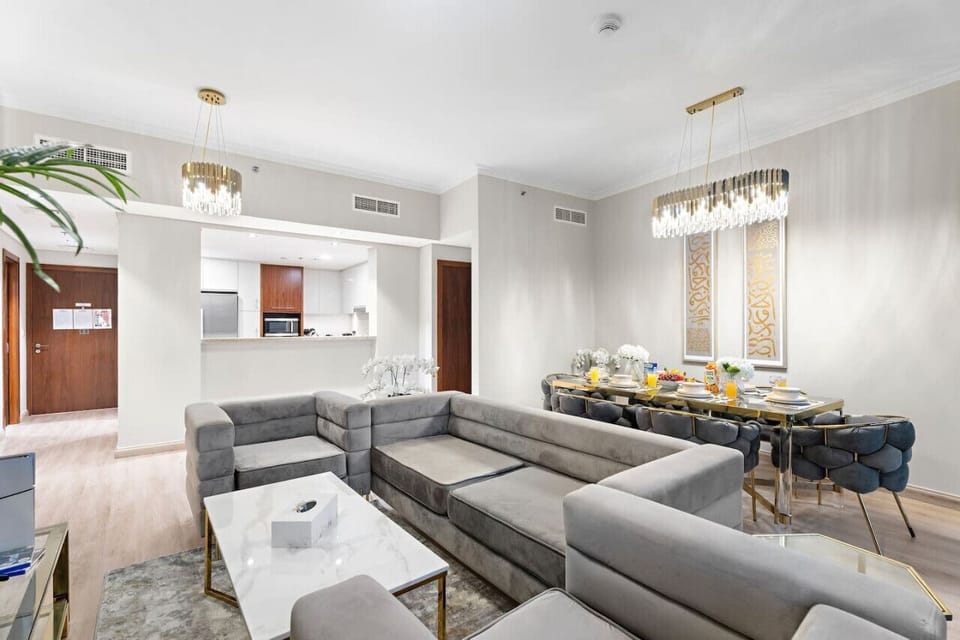Living Room: Modern elegance with plush seating and a stunning dining area for memorable gatherings!