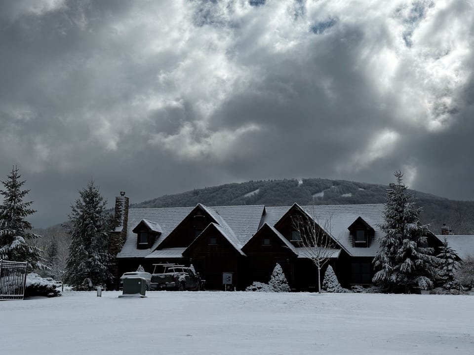 Front of home with Timberline Mountain Ski Resort behind. 