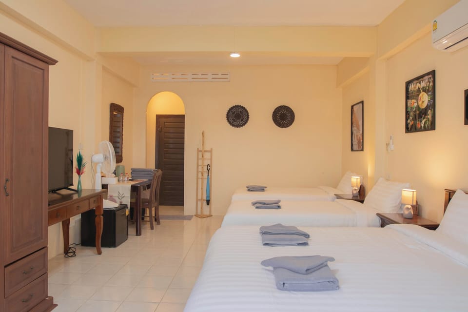 Family Quadruple Room | In-room safe, desk, laptop workspace, iron/ironing board