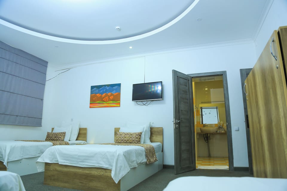 Economy Quadruple Room | Desk, laptop workspace, soundproofing, iron/ironing board