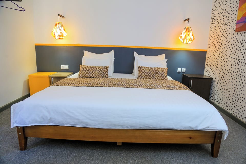 Comfort Double Room, City View | Desk, laptop workspace, soundproofing, iron/ironing board