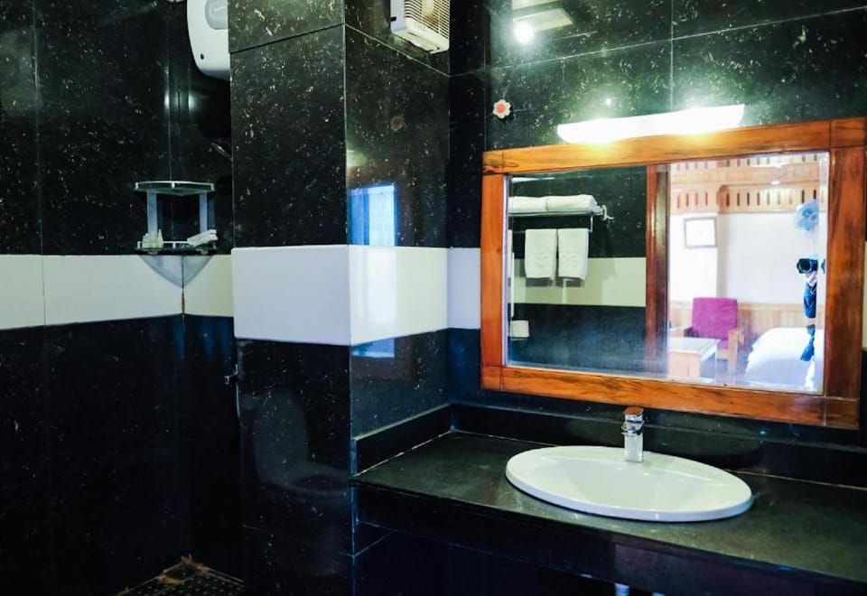 Shower, free toiletries, slippers, towels