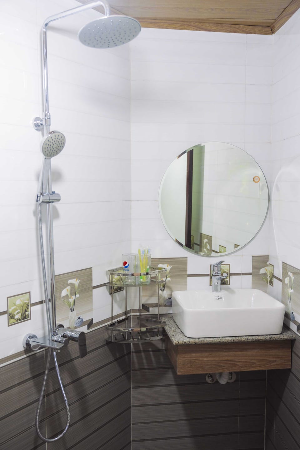 Rainfall showerhead, designer toiletries, hair dryer, slippers