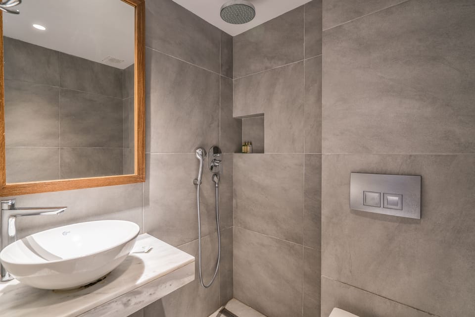 Designer toiletries, hair dryer, towels