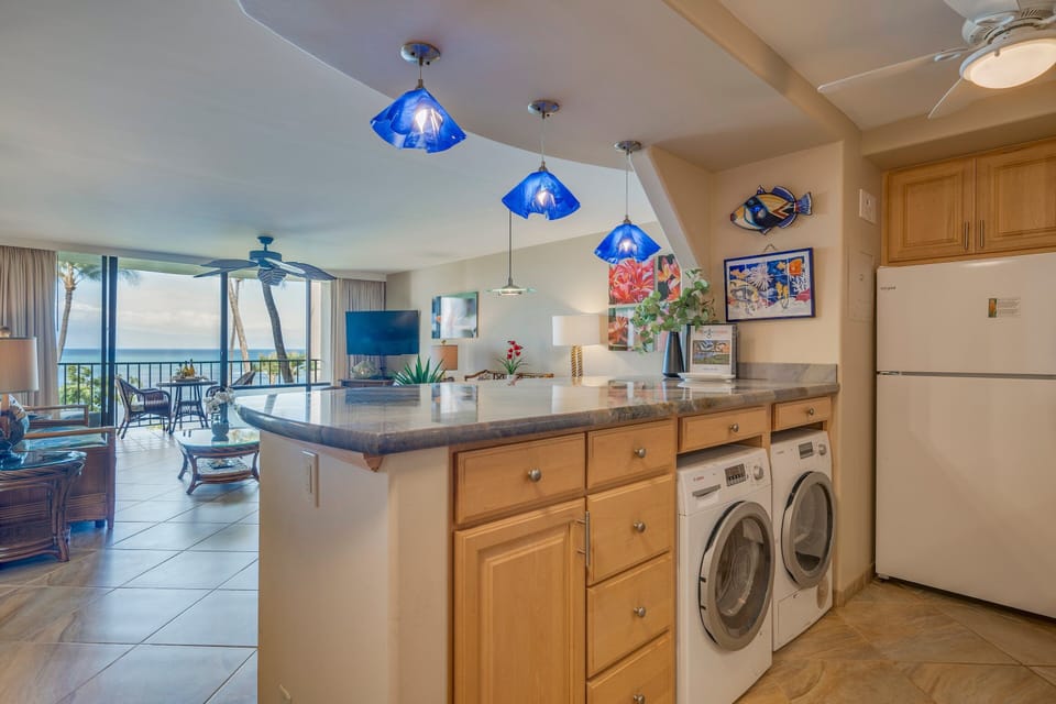 Washer & dryer located in the kitchen