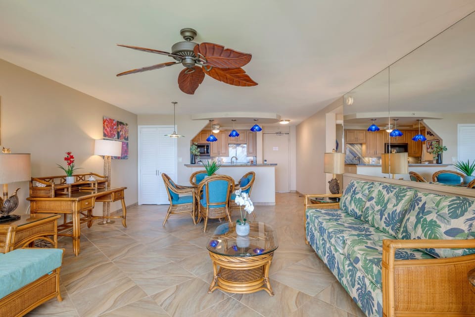 Tile floor throughout the kitchen and living room