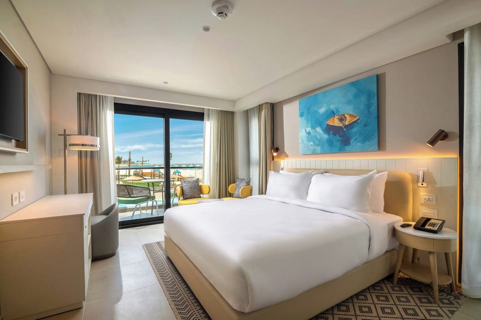 Suite, 2 Bedrooms, Sea View | Minibar, in-room safe, iron/ironing board, cribs (free)