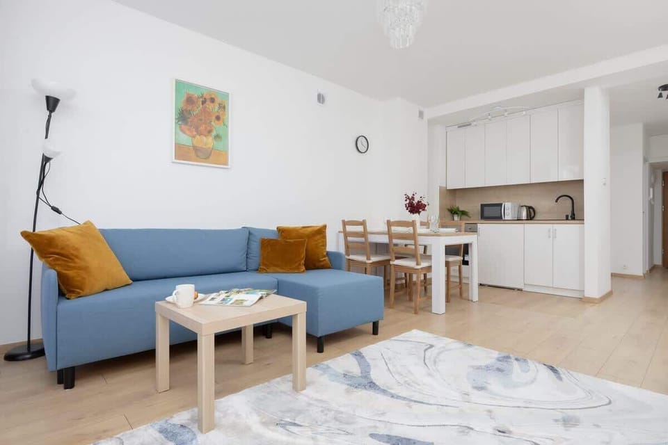 The living area is harmoniously combined with a functional kitchenette.