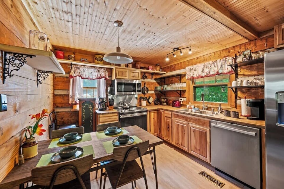 Gather around the table for cozy meals surrounded by cabin character.