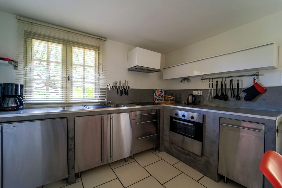 Comfort Apartment, 1 King Bed, Patio, Pool View | Private kitchen | Reusable coffee/tea filters