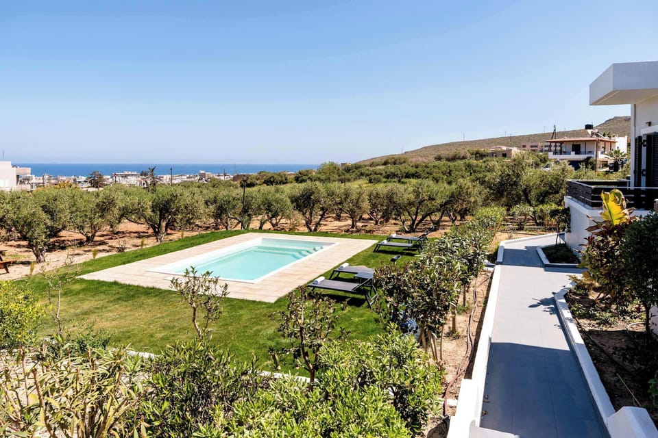 
A beautiful outlook combining open landscapes, the pool, and coastal views.