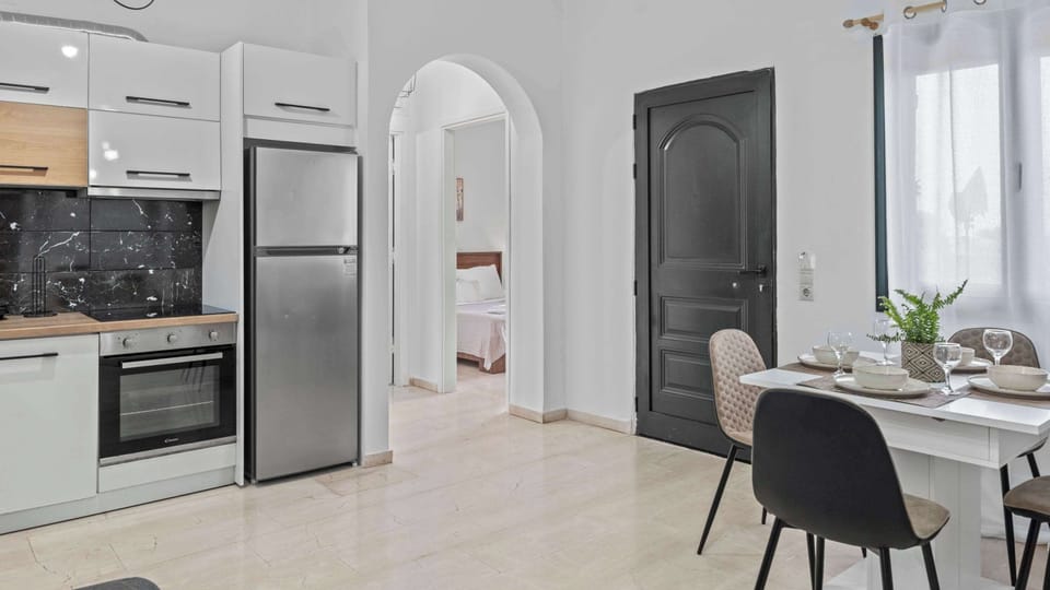 Neatly designed kitchen with direct access to lounge

