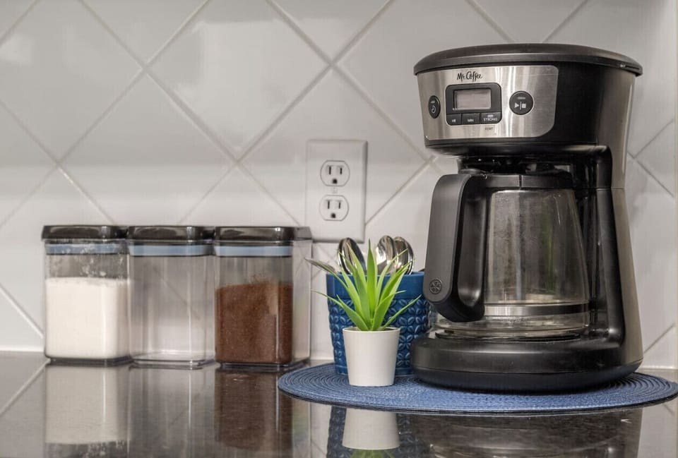 Full kitchen with a blender, crockpot, drip coffee maker, Keurig, waffle maker, electric frying pan & kettle
