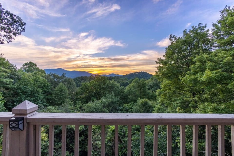 Painted skies and mountain views-this view from the deck is your front row seat to gorgeous sunsets over Grandfather Mountain