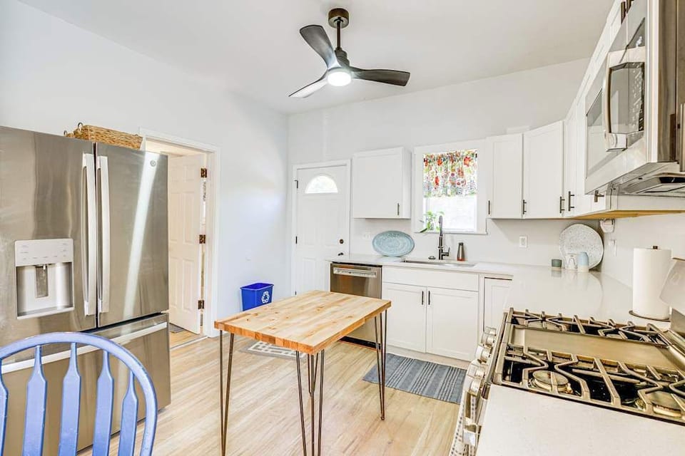 Full kitchen that connects to the main floor full bathroom and access to deck