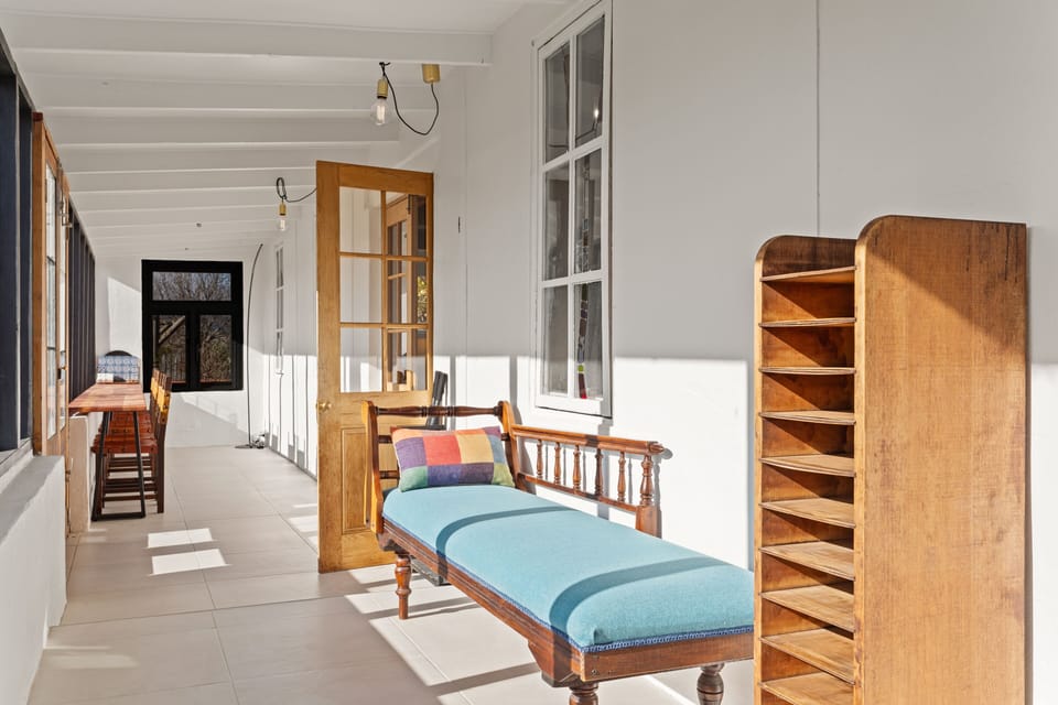 Enjoy the warmth and brightness of the light-soaked sunroom