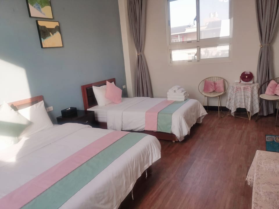 Family Triple Room, Partial Ocean View | Individually decorated, individually furnished, free WiFi