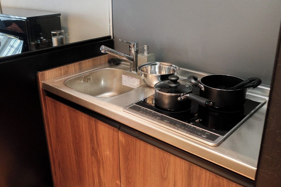 Accommodates three-person, Non Smoking | Private kitchen | Full-size fridge, microwave, stovetop, cookware/dishes/utensils